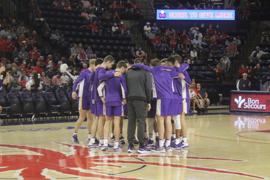 UNIs scheduled mens basketball game at Virginia was canceled after a shooting in Charlottesville that killed three members of Virginias football team. 