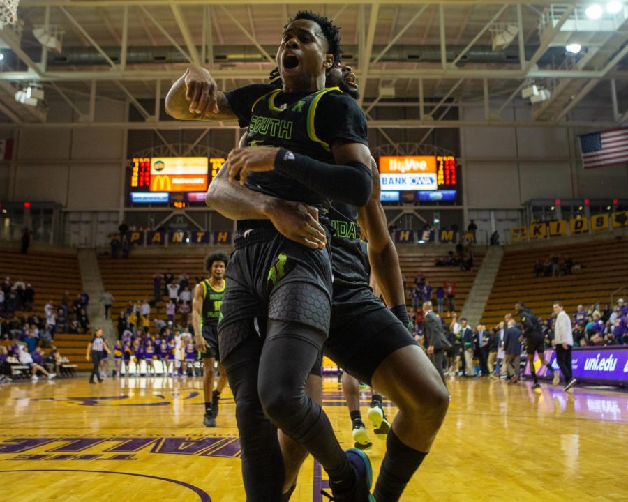 Tyler Harris celebrates after hitting the game-winning three to defeat UNI, 72-69, on Monday.