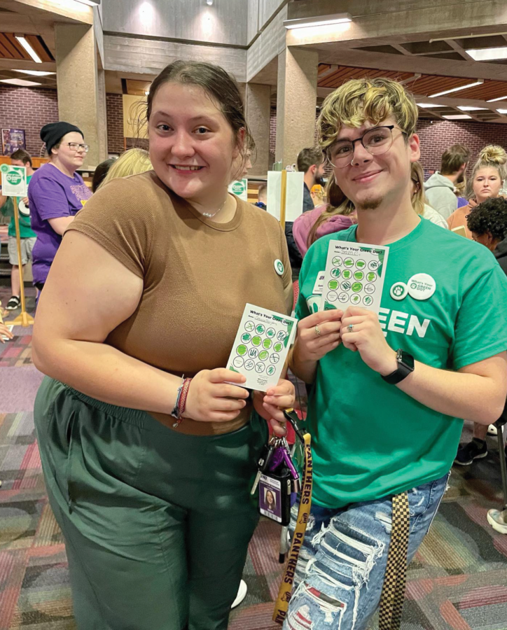 Two members of NISG participate in activities at the Green Dot launch in September. Since its launch, over 100 students and over 132 staff and faculty members have been through training with the program. 