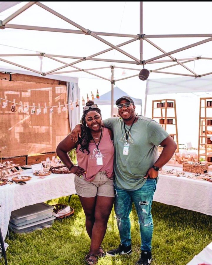 Ebony King of Waterloo, Iowa, started her clay jewelry business as simply a hobby during the COVID-19 pandemic. Today, she is the proud owner of Formed, specializing in jewelry design and workshops. She is pictured above with her husband Travor and her products on display at a vendor fair. 