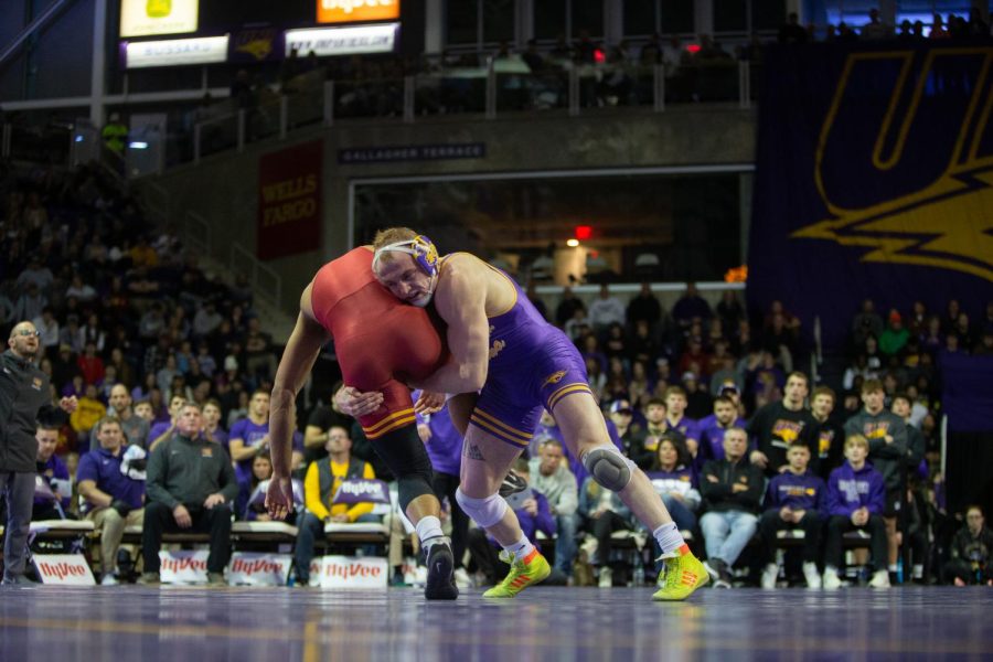 Parker Keckeisen attempts a takedown during No. 14 UNIs 19-12 loss against No. 3 Iowa State in front of a near-record breaking crowd of 5,754. 