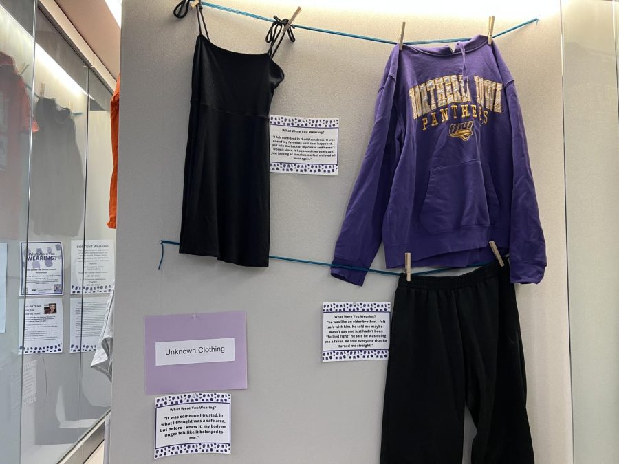 The What Were You Wearing? exhibit aims to educate people that sexual assault can happen to anyone at any time, no matter what they may be wearing. This photo shows submissions from previous years, ranging from a dress to a sweatshirt and sweatpants.