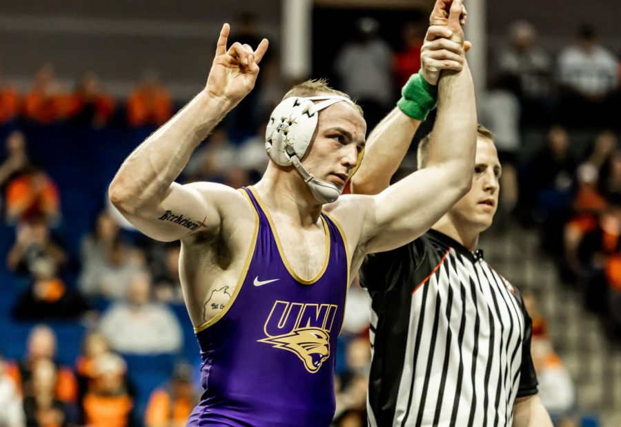 Parker+Keckeisen+has+his+hand+raised+in+victory.+Keckeisen+captured+a+third+straight+Big+12+Championship+over+the+weekend%2C+and+will+enter+the+NCAA+Championships+with+a+22-1+record+on+the+season.+