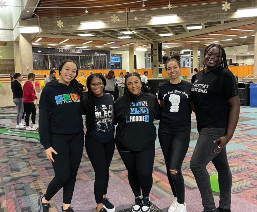 Lexi Gause, pictured center, is the co-president of UNI’s Black Student Union. She is one of many women at UNI who have stepped up into leadership roles thanks in part to the sense of community and support in her organization.