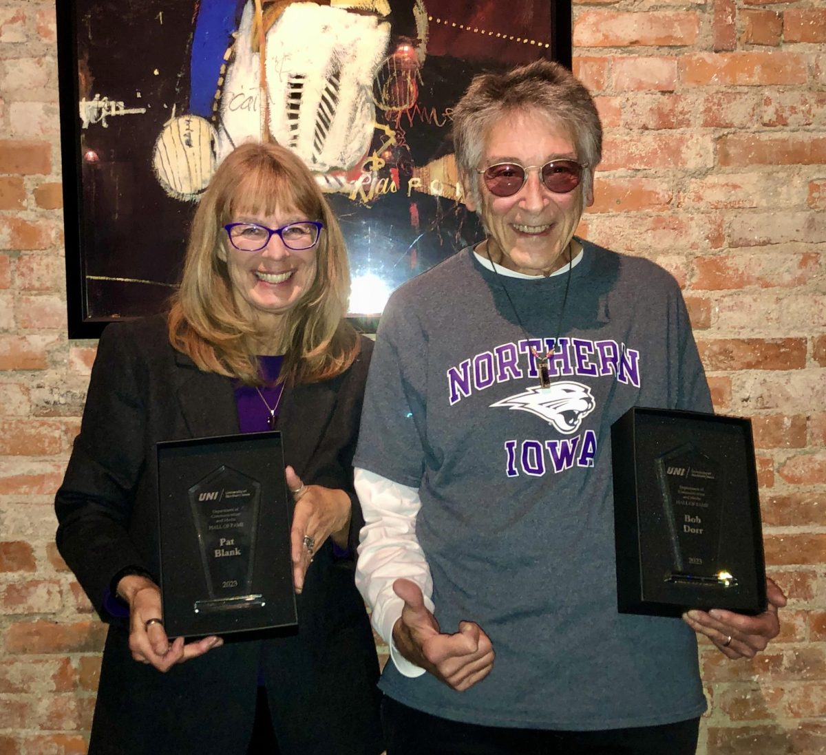 Blank+and+Dorr+pose+with+their+inductee+plaques.+Blank+had+a+43-year+long+broadcasting+career%2C+and+Dorr+had+over+50+years+of+experience+working+with+Iowa+Public+Radio.