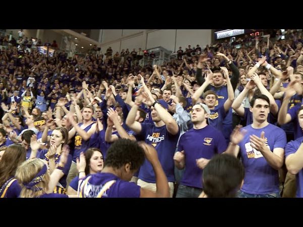 Students perform the Interlude in 2015 at UNI versus Witchita State. The Interlude is taught to freshman at orientation, and is often played at UNI sporting events.