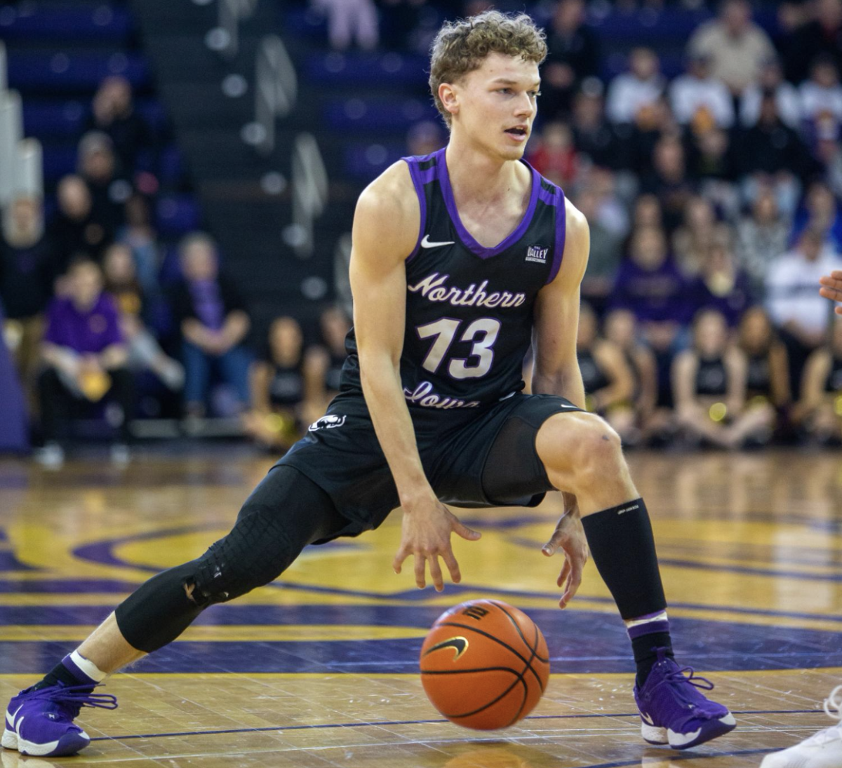 Bowen Born dribbles up the court during a game.