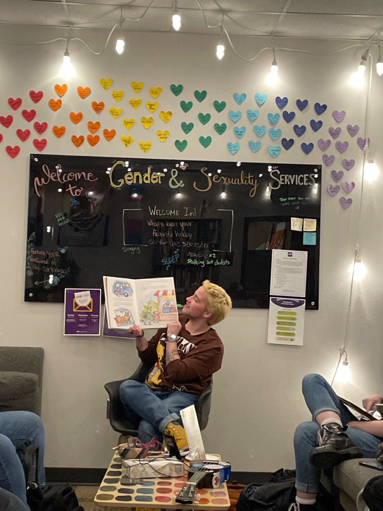 UNI alum Archer Trip volunteers to lead the Queer Book Club. The group
meets to discuss the queer books they are reading and to create a safe
space of community for LGBT students and allies.