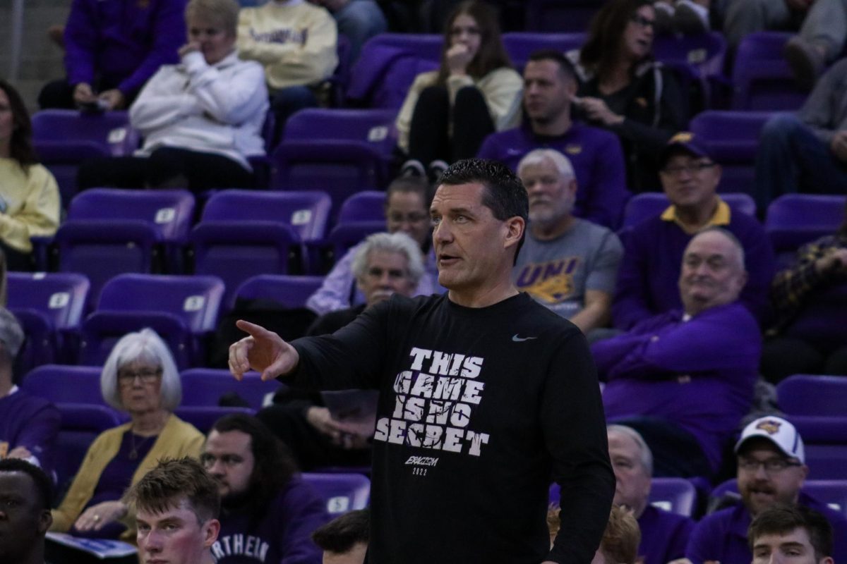 Ben Jacobson encourages and coaches his team in the McLeod Center.