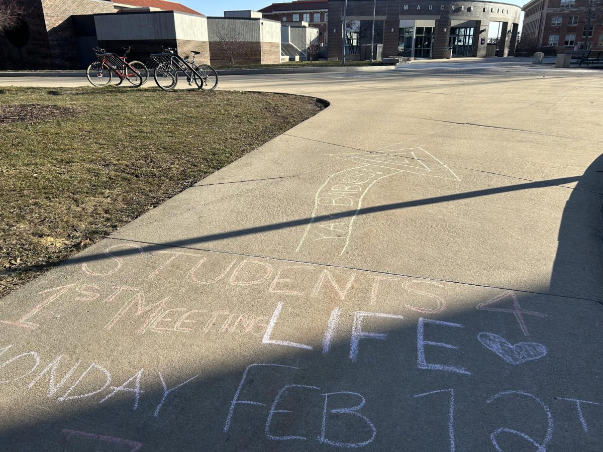 Chalk appeared around campus last week promoting the first Students
for Life meeting of the semester. The chalk above promotes the meeting’s
place and time with the phrase “Yay babies!” at the top.