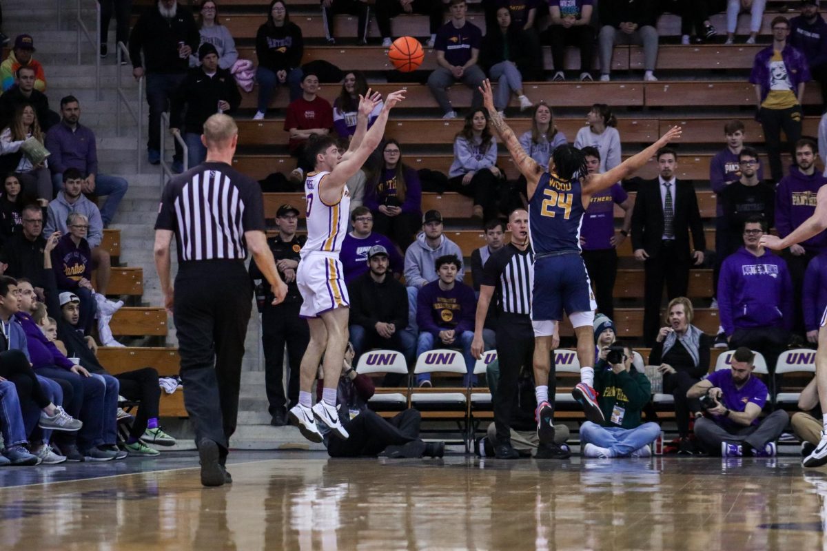 Nate Heise hits a shot from behind the arc in front of a hometown crowd.