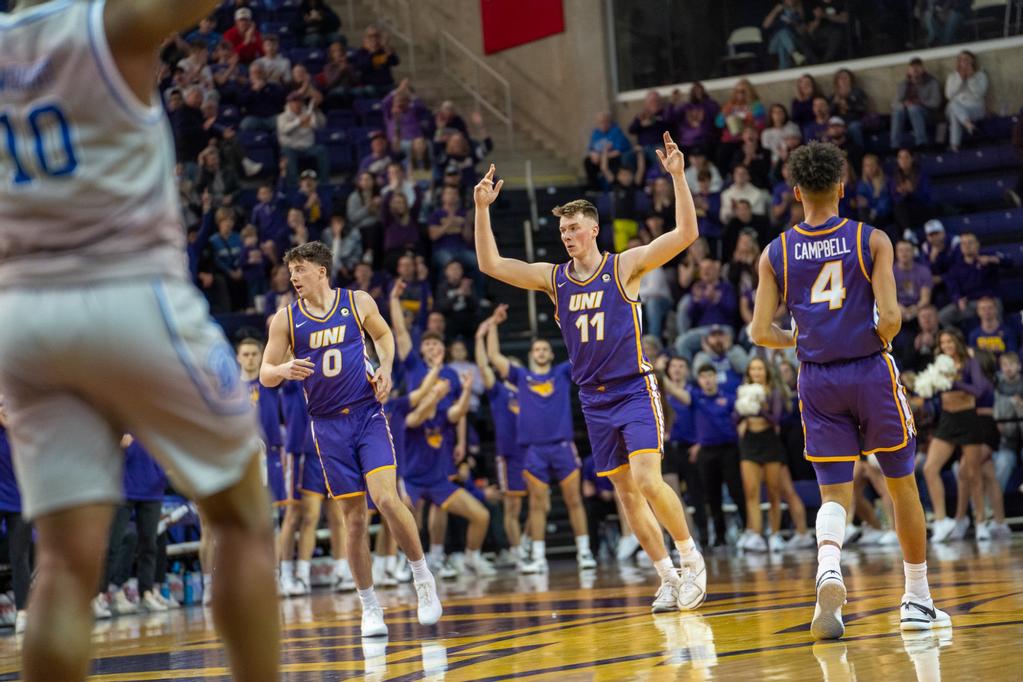 Nate Heise, Jacob Hutson and Trey Campbell get the crowd hyped up as the win is in their sights.