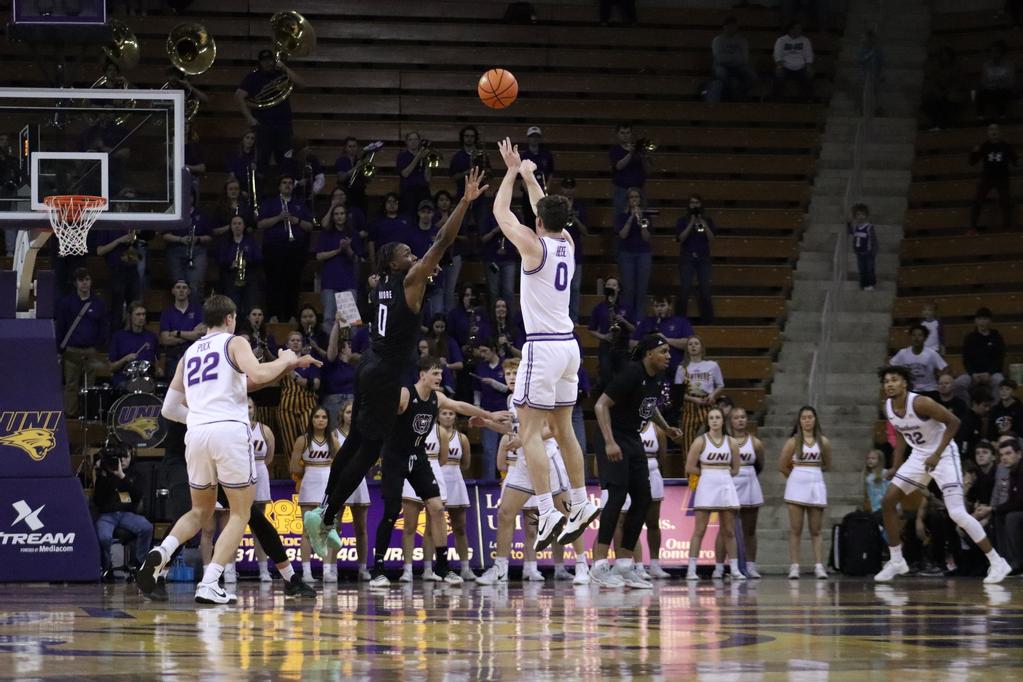 Nate Heise rises up for an incredible shot. Heise led the Panthers with 17 points.