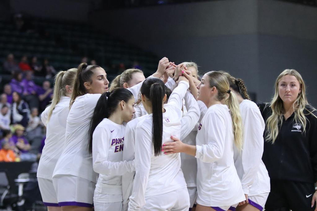 The team met in a huddle before the game to get on the same page.