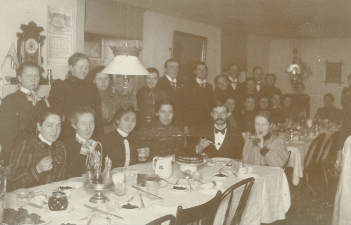 Dinner at Rownd Hall boarding house. (undated)