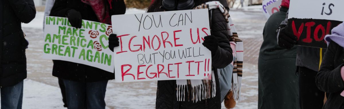 More than 50 protestors showed up, holding signs and shouting chants.