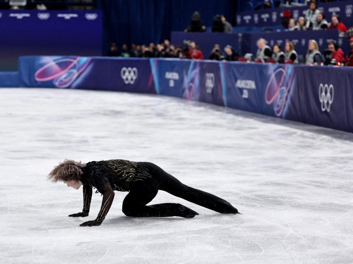 Milano Cortina 2026 Olympics - Figure Skating - Men Single Skating - Free Skating - Milano Ice Skating Arena, Milan, Italy - February 13, 2026. Ilia Malinin of United States falls during the Free Skating.