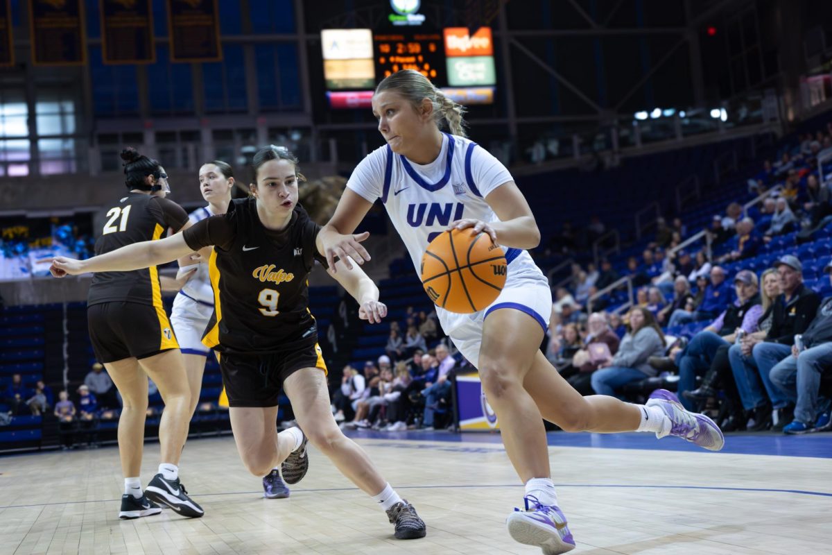 Virginia Edmondson dribbles past a Valparaiso defender in a 92-54 victory against the Beacons.